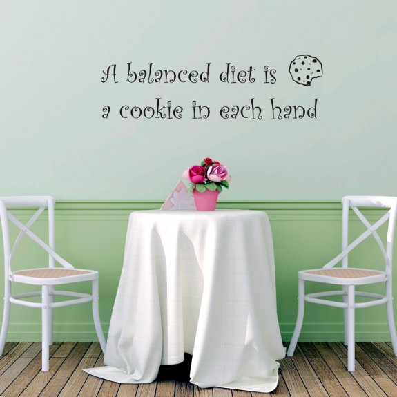 Väggtext väggord A balanced diet is a cookie in each hand